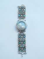 Horloge aqua en crystal