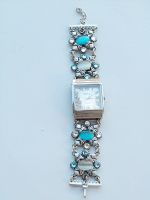 Horloge aqua en witte stenen